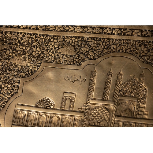 142 - An Islamic Qajar Brass Tray with Masjid Shah Engraved, 19th Century.

Approximately 46.3cm x 33cm