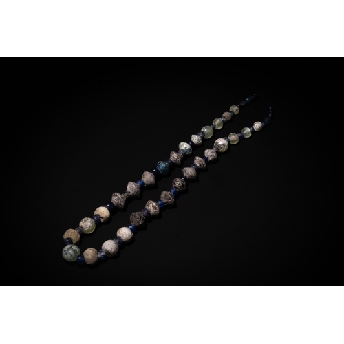 264 - A Roman Glass Beads Necklace, with Lovely Patina.

Half Breaded Length: Approximately 35cm