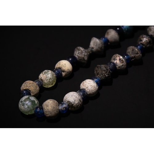 264 - A Roman Glass Beads Necklace, with Lovely Patina.

Half Breaded Length: Approximately 35cm