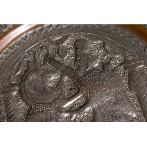 150 - A Silver Plated Dish with Heroic Scene of a Man Attacking a Lion, Late Vintage Period.

D: Approxima... 