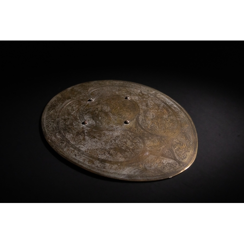 16 - **NO RESERVE**

An Islamic Oval Shaped Copper Engraved Central Applique of Probably a Shield, Circa ... 