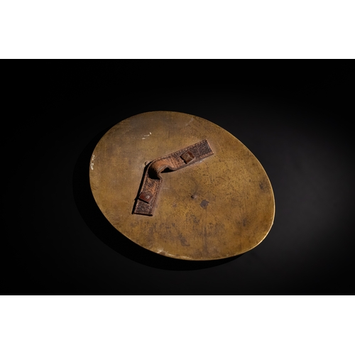 16 - **NO RESERVE**

An Islamic Oval Shaped Copper Engraved Central Applique of Probably a Shield, Circa ... 