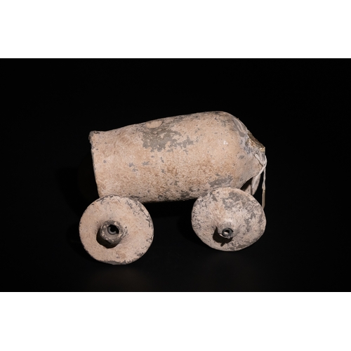 269 - An Ancient Rare Clay Wheeled Tanker, Circa 1500 B.C. - 1200 B.C., Probably Used as a Toy.

L: Approx... 