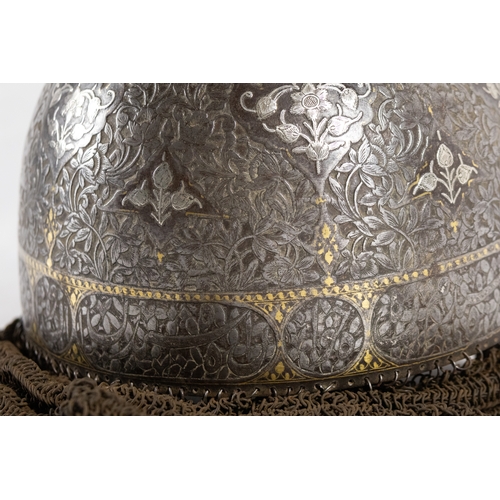 156 - An Islamic Qajar Gold Damascened Steel Helmet and Shield, 19th Century.

Shield D: Approximately 46c... 