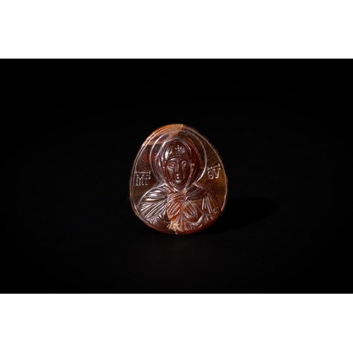 283 - An Agate Icon Pendant Presenting the Virgin Bust in High Relief with the Letter of her Name, Late By... 