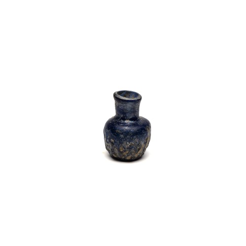 61 - An Islamic Miniature Blue Moulded Glass Bottle, 11-12th Century.

H: Approximately 5cm