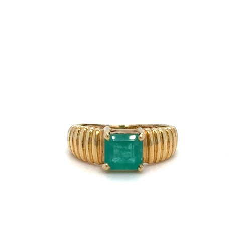 115 - A Brazilian Emerald Ring Set on 18 Carat Gold, Circa 1980's.

3.2g