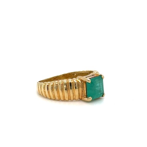 115 - A Brazilian Emerald Ring Set on 18 Carat Gold, Circa 1980's.

3.2g