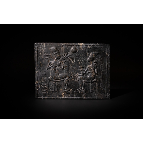 71 - A Egyptian Stone Plaque Representing Isis & Horus.

This depiction of Isis presents the goddess in t... 