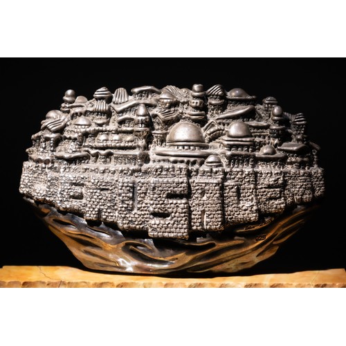 7 - An Israeli Silver Sculpture of Jerusalem by Ben Zion on a Stand.

L: Approximately 15.3cm

Provenanc... 