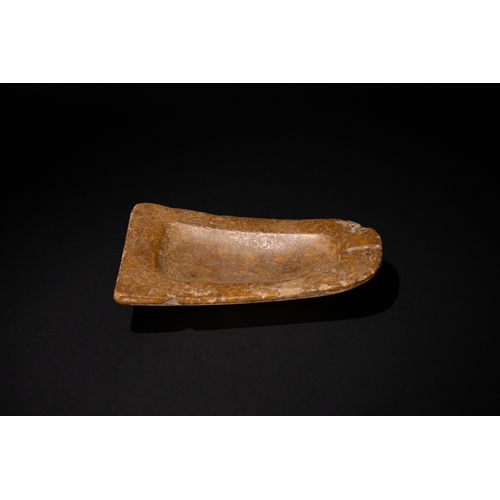 77 - A Stone Fragment from a Mould, Archaic Greek Period, 700-600 B.C.

L: Approximately 14.7cm