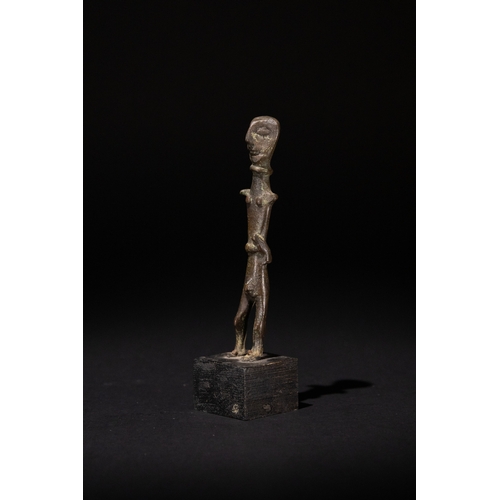 78 - A Luristani Bronze Sculpture of a Standing Man, 1st Millennium B.C. (800-2000 B.C.), Mounted on a St... 