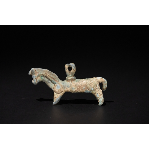 79 - A Luristani Bronze Figure of a Standing Horse, 1st Millennium B.C.

L: Approximately 7.7cm