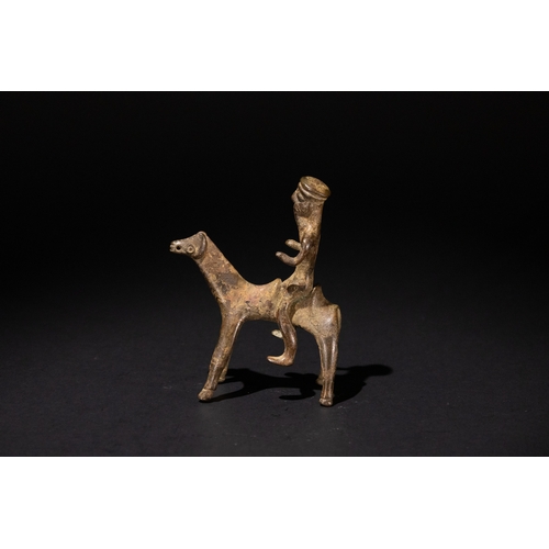 80 - A Luristani Bronze Figure of a Rider on Horse, 1st Millennium B.C.

L: Approximately 7cm
H: Approxim... 