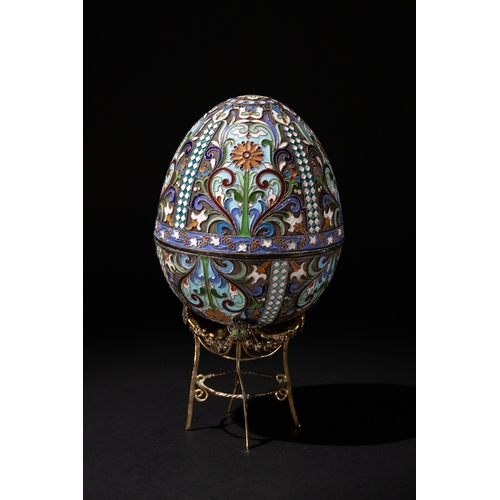 11 - A Russian 84 Standard Silver & Cloisonné Enamel Egg with a Silver Stand.

H: Approximately 10.8cm
34... 