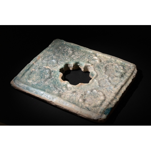 305 - An Islamic Persian Turquoise Glazed Pottery Tile, 13-14th Century.

Approximately 35cm x 29.5cm

Pro... 