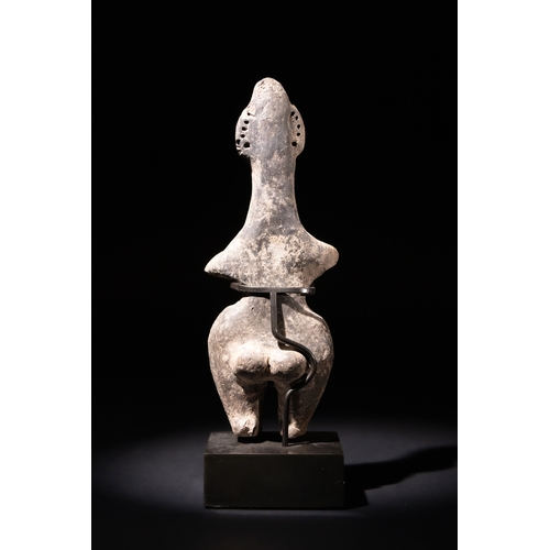 86 - A Near Eastern Terracotta Amlash Goddess Idol, 800-1000 B.C.

H: Approximately 17cm 

W: Approximate... 