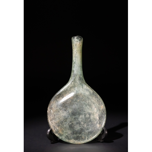 89 - A Roman Glass Pilgrim Flask, Circa 3rd-4th Century A.D.

H: Approximately 16cm