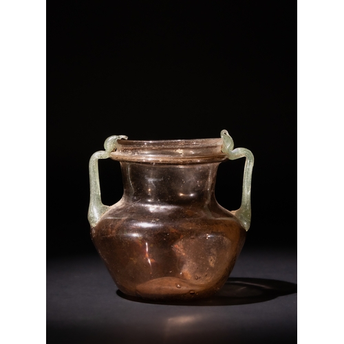 90 - A Roman Aubergine Glass Jar with Green Twin Handles, 3rd-4th Century.

H: Approximately 9cm