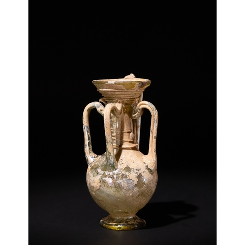 96 - A Roman Glass Four-Handled Flask, Circa 4th-5th Century A.D.

H: Approximately 10.9cm