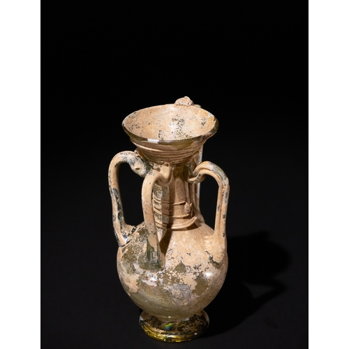 96 - A Roman Glass Four-Handled Flask, Circa 4th-5th Century A.D.

H: Approximately 10.9cm