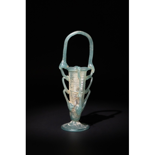 98 - A Roman Glass Unguentarium, Circa 4th-5th Century A.D.

H: Approximately 19cm