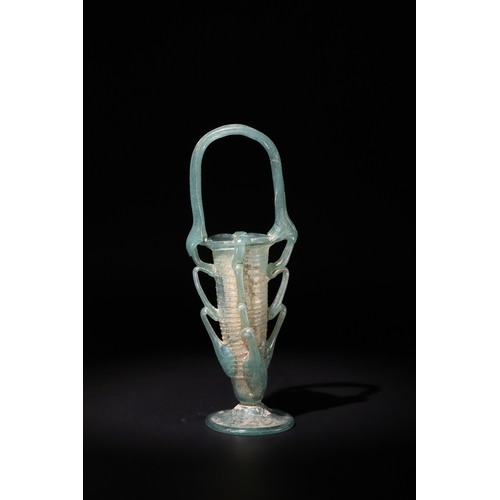 98 - A Roman Glass Unguentarium, Circa 4th-5th Century A.D.

H: Approximately 19cm