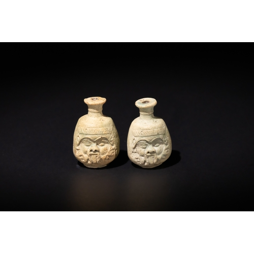 99 - A Pair of Egyptian Glazed Bes Flasks, Ptolemaic Period, 332-30 BC.

H: Approximately 4.6cm