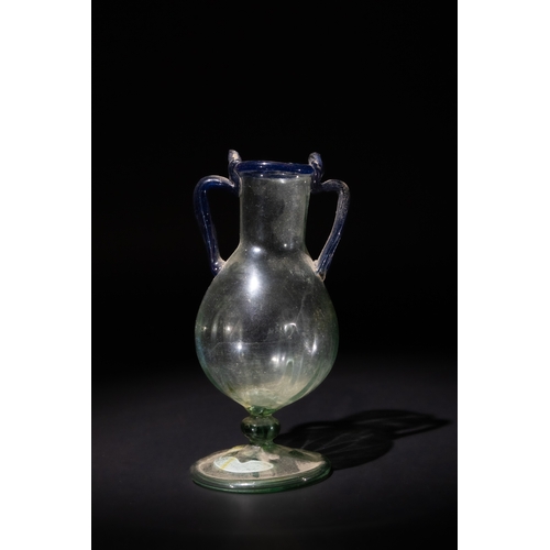 100 - A Roman Green Glass Amphora with Blue Twin Handles.

H: Approximately 13.5cm