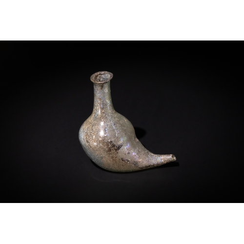 101 - A Roman Glass Feeder-Vessel (Askos), 1st - 2nd Century.

H: Approximately 9.7cm