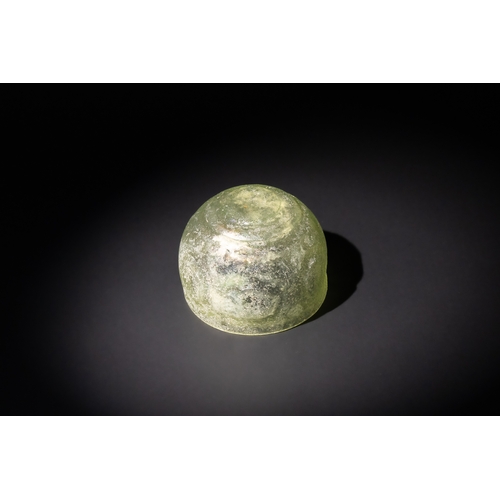 104 - An Early Sasanian Green Glass Facet-Cut Bowl, Circa 5th-6th Century A.D.

H: Approximately 7cm
D: Ap... 