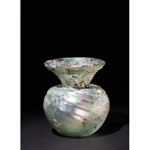 106 - A Roman Green Glass Sprinkler Flask, 4th Century A.D., Decorated with Consistent Spiralised Patterns... 