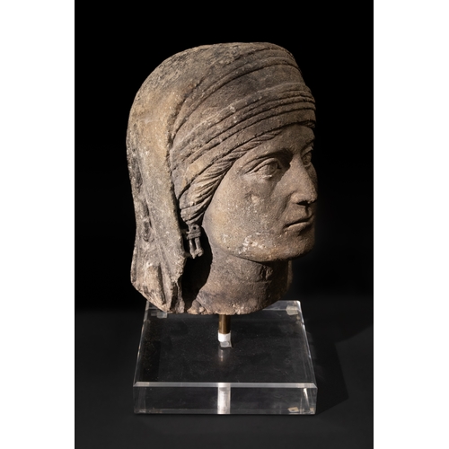 111 - An Eastern Roman Marble Head of a Deity, 1st Century B.C. - 1st Century A.D.

H: Approximately 29cm
... 