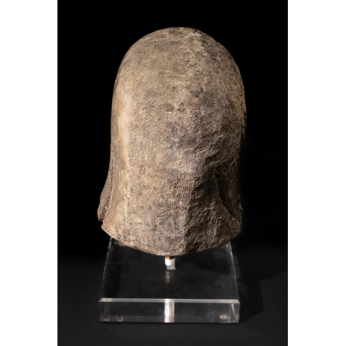 111 - An Eastern Roman Marble Head of a Deity, 1st Century B.C. - 1st Century A.D.

H: Approximately 29cm
... 