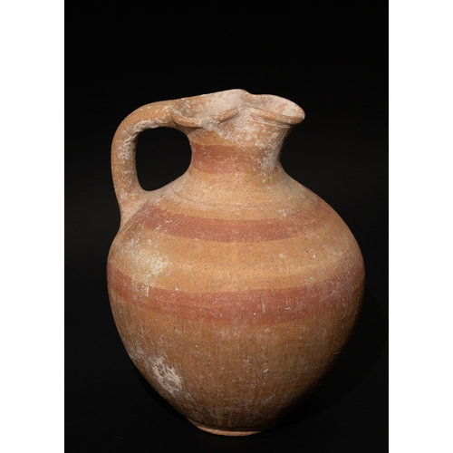 112 - A Cypriot Bichrome Pottery Jug, Circa 1050-750 B.C., with a Trefoil-Shaped Sprout. 

H: Approximatel... 