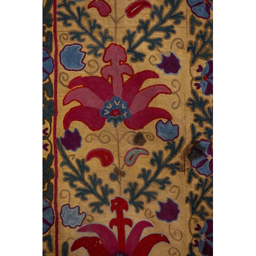 333 - An Uzbek Silk on Silk Suzani Embroidery, 19th Century.

Approximately 145 x 111cm

The embroidery in... 