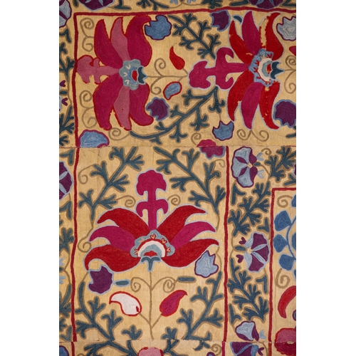 333 - An Uzbek Silk on Silk Suzani Embroidery, 19th Century.

Approximately 145 x 111cm

The embroidery in... 