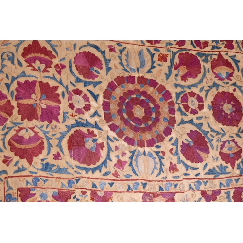 335 - An Uzbek Silk on Cotton Suzani Embroidered Curtain Textile, 19th Century.

Approximately 231 x 159cm... 