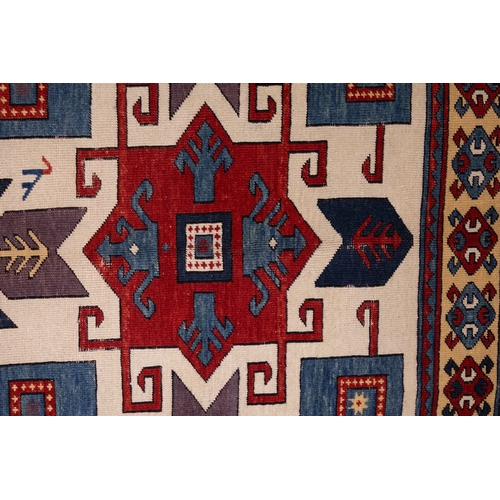 344 - A Caucasian Star Kazak Wool Rug, 19th Century.

Approximately 196 x 172cm

Kazak rugs are known for ... 