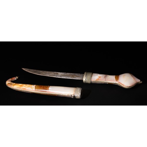 369 - **NO RESERVE** 

A North African Hard Stone Dagger with Cover, 20th Century.

L: Approximately 44cm
... 