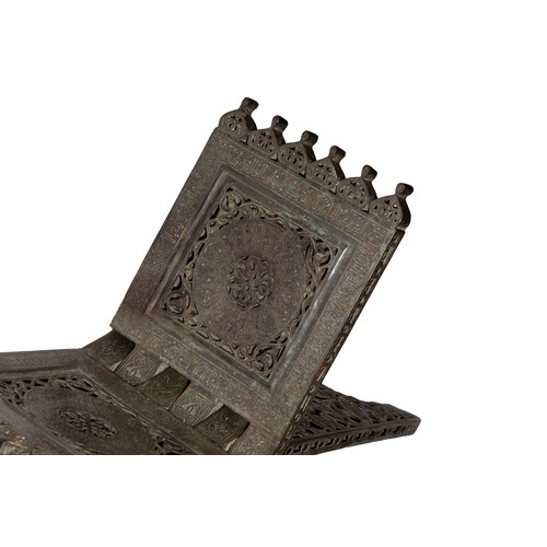 71 - An Islamic Silver-Inlaid Quran Holder, Late 19th Century.

A Quran holder from the late 19th century... 