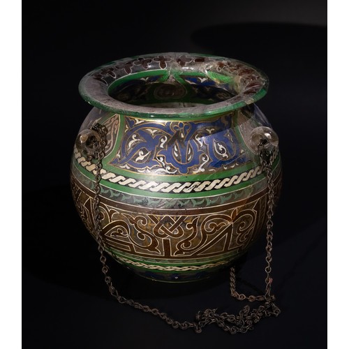 84 - An Islamic Painted Glass Mosque Lamp with Suspension Chains, 19th Century.

This Islamic mosque lamp... 