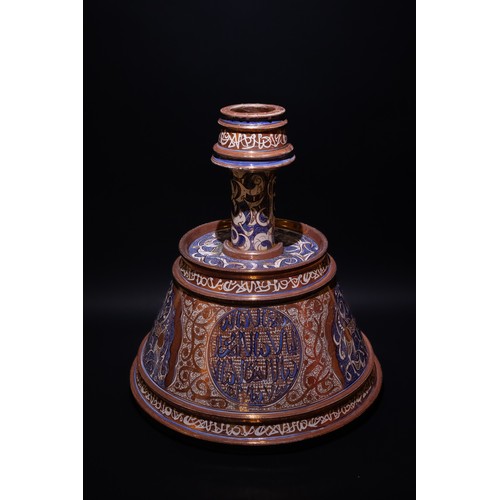 85 - An Islamic Hispano-Moresque Style Lustre Pottery Candlestick, 19-20th Century.

A ceramic candlestic... 