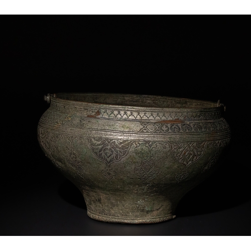 89 - An Islamic Safavid Engraved Tinned Copper Pail, 16th-17th Century.

This Islamic Safavid tinned copp... 