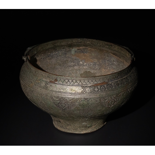 89 - An Islamic Safavid Engraved Tinned Copper Pail, 16th-17th Century.

This Islamic Safavid tinned copp... 