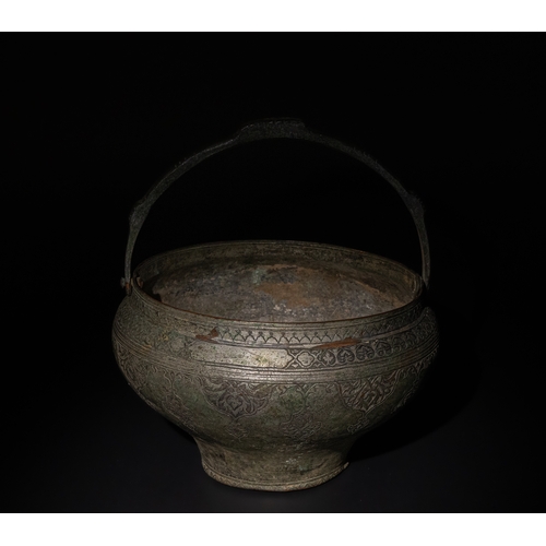 89 - An Islamic Safavid Engraved Tinned Copper Pail, 16th-17th Century.

This Islamic Safavid tinned copp... 