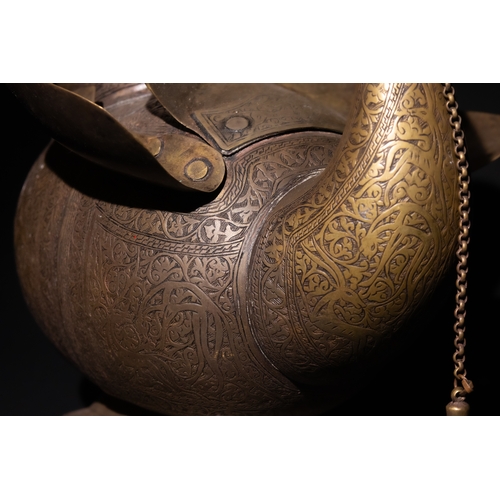 159 - An Indo-Persian Brass Peacock Water Jug.

This exquisite Indo-Persian brass water jug is designed in... 