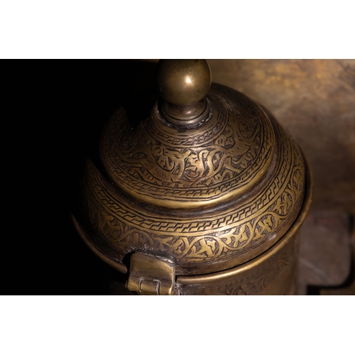 159 - An Indo-Persian Brass Peacock Water Jug.

This exquisite Indo-Persian brass water jug is designed in... 