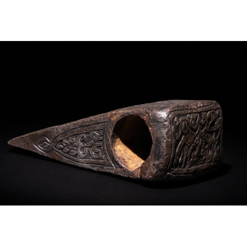 96 - An Islamic Indo-Persian Engraved Iron Axe Head with Calligraphy and Floral Motifs.

The axe head is ... 