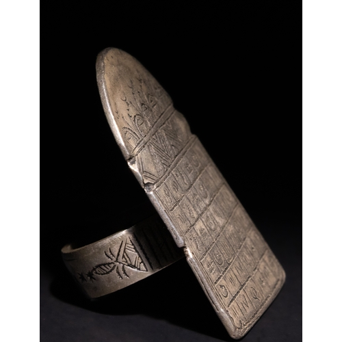 315 - **NO RESERVE**

An Islamic Persian Silver Talismanic Ring with Inscriptions.

The silver talismanic ... 